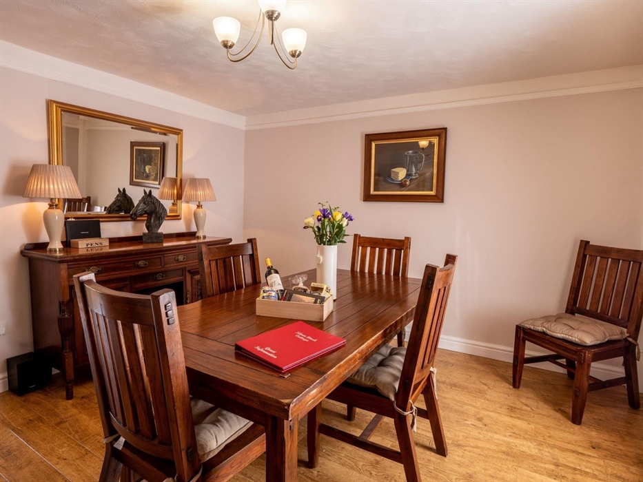 Entertain guests at the large table with 6 chairs.