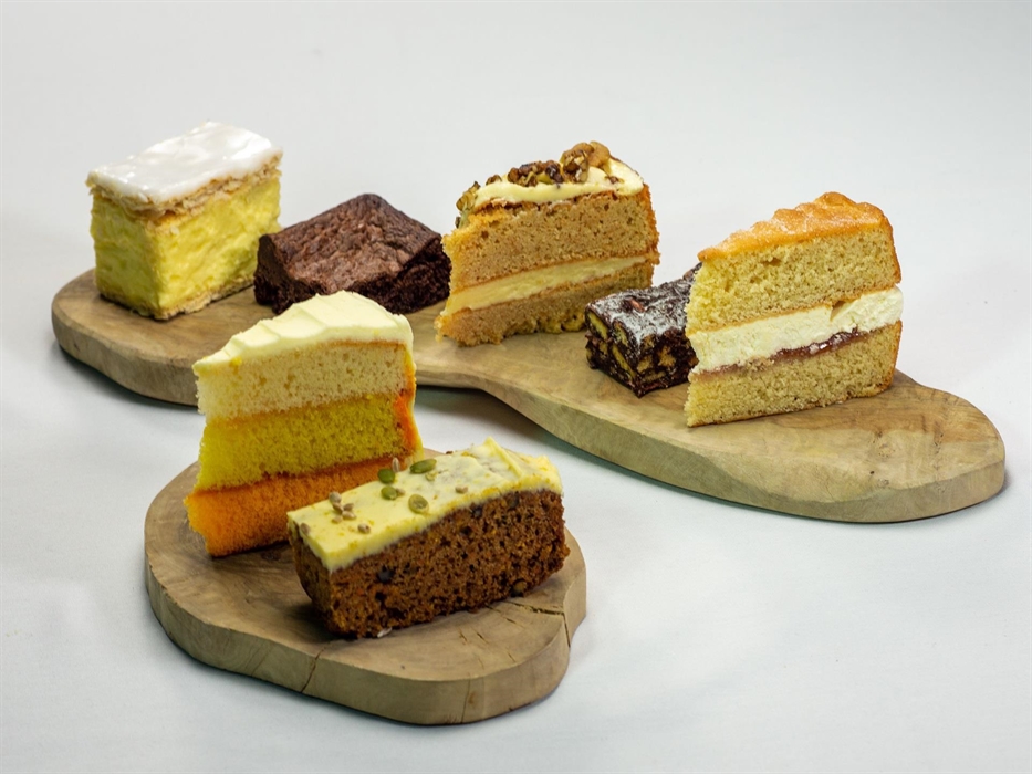 A wide selection of cake is available.
