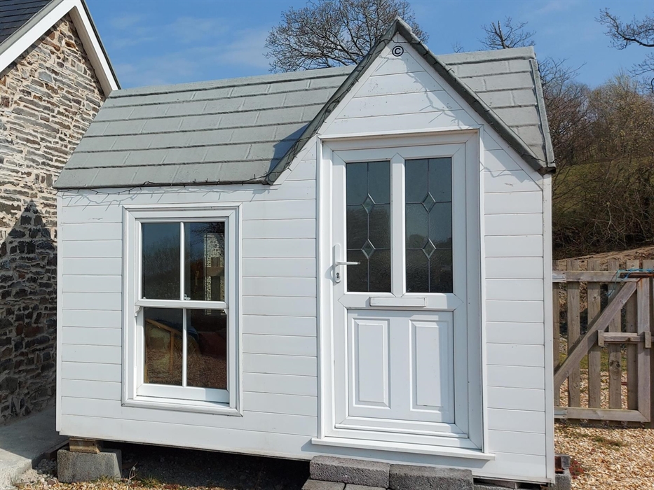 Lockable storage for bicycles and large pets if needing to go out without them.