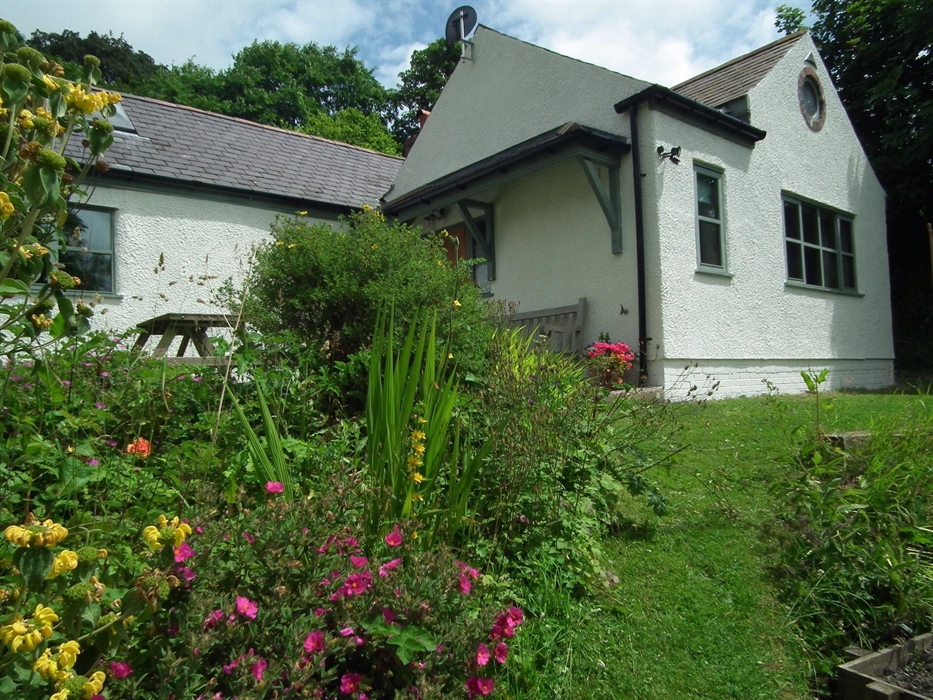 Cottage and garden in summer