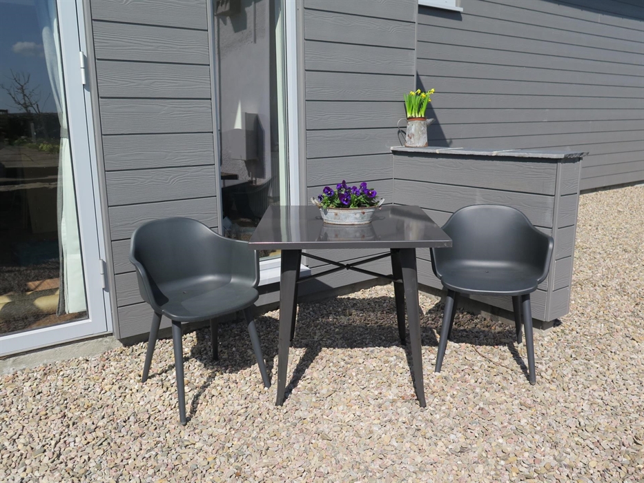 Patio seating ready for arrival drinks overlooking the valley view