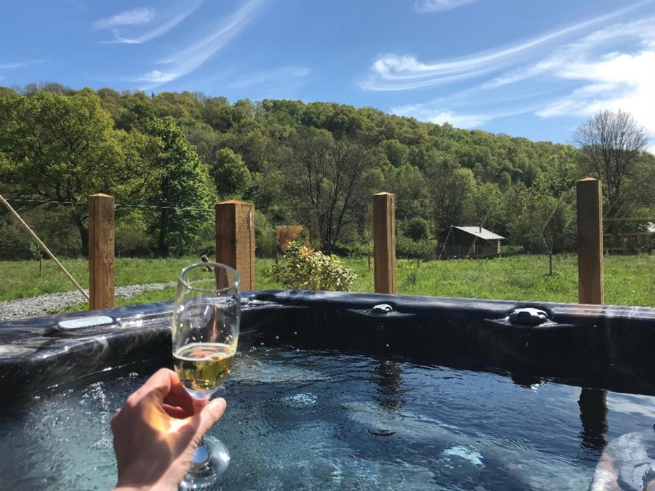 Relaxing in the hot tub with a glass of fizz on a warm Summer's evening - can it get any better?