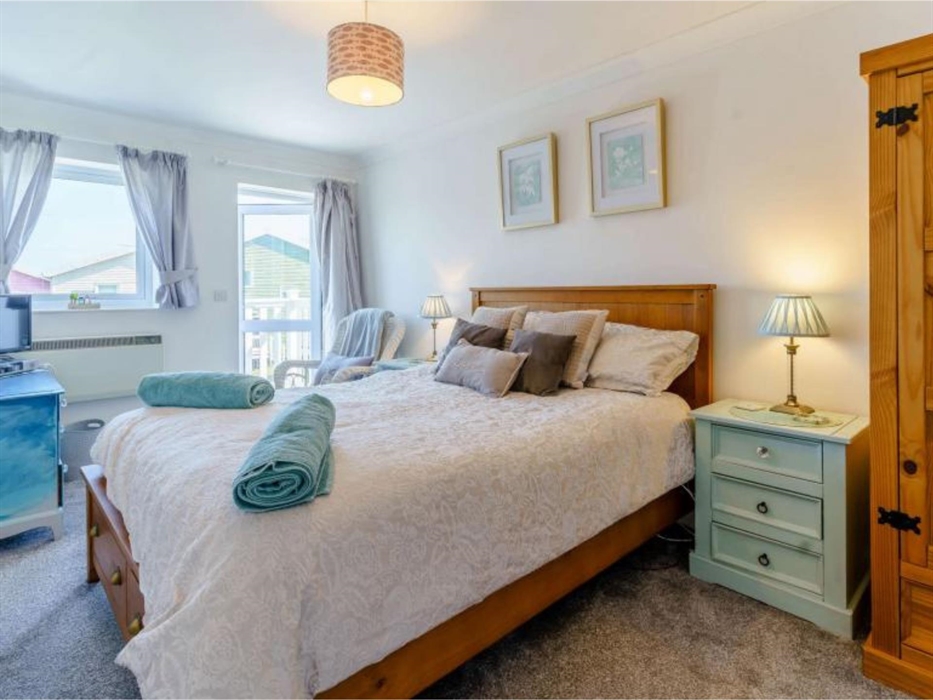 Really lovely large master bedroom, with a new oak bed, firm to soft mattress, and a lovely balcony.  It also has an en suite shower room.