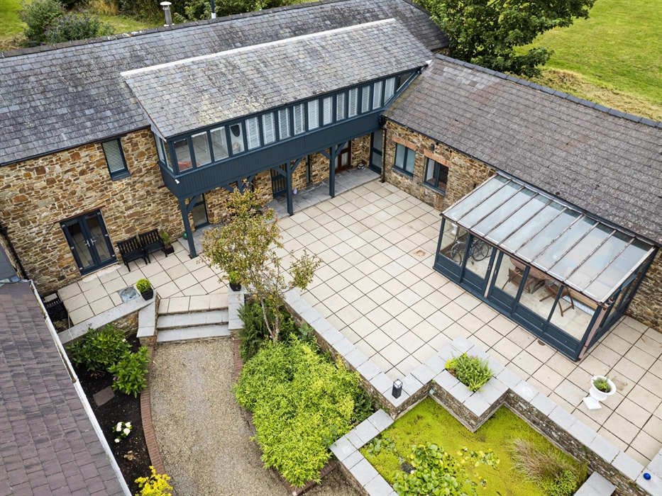 Discover tranquility in a private internal courtyard featuring a peaceful fishpond, a calm space for reflection amidst nature’s gentle embrace.