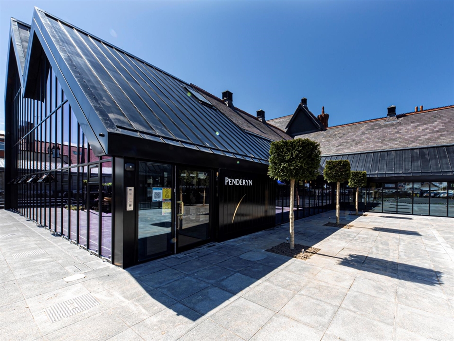 Main entrance at the back of the building.