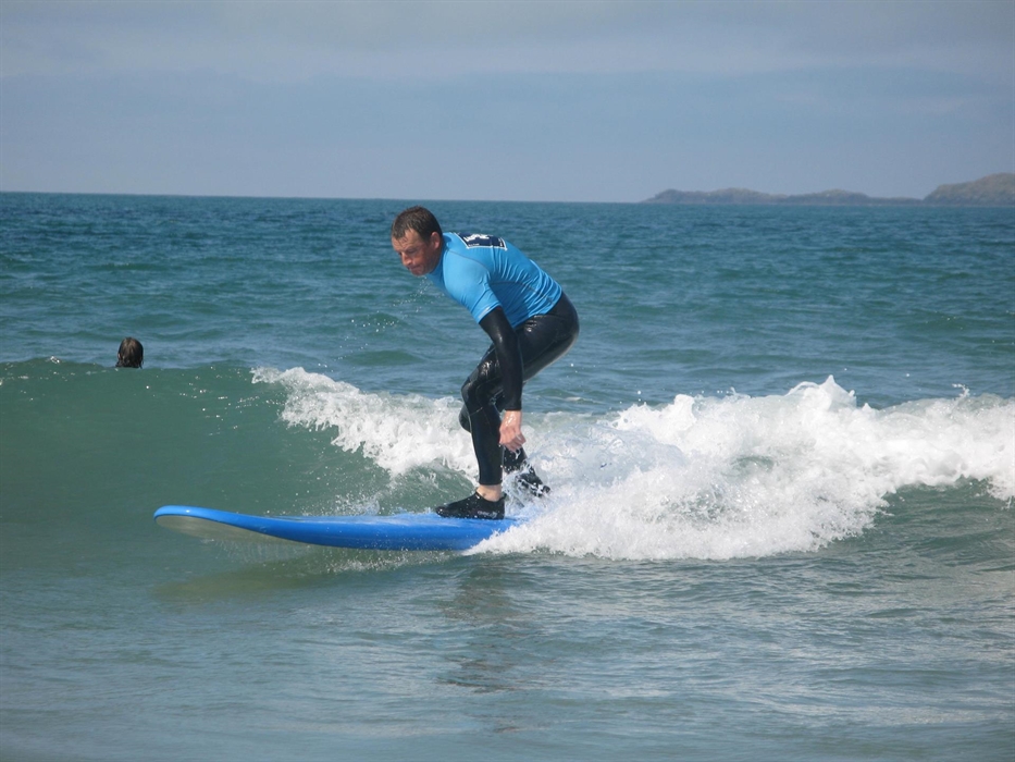 Learning to surf in St Davids Pembrokeshire