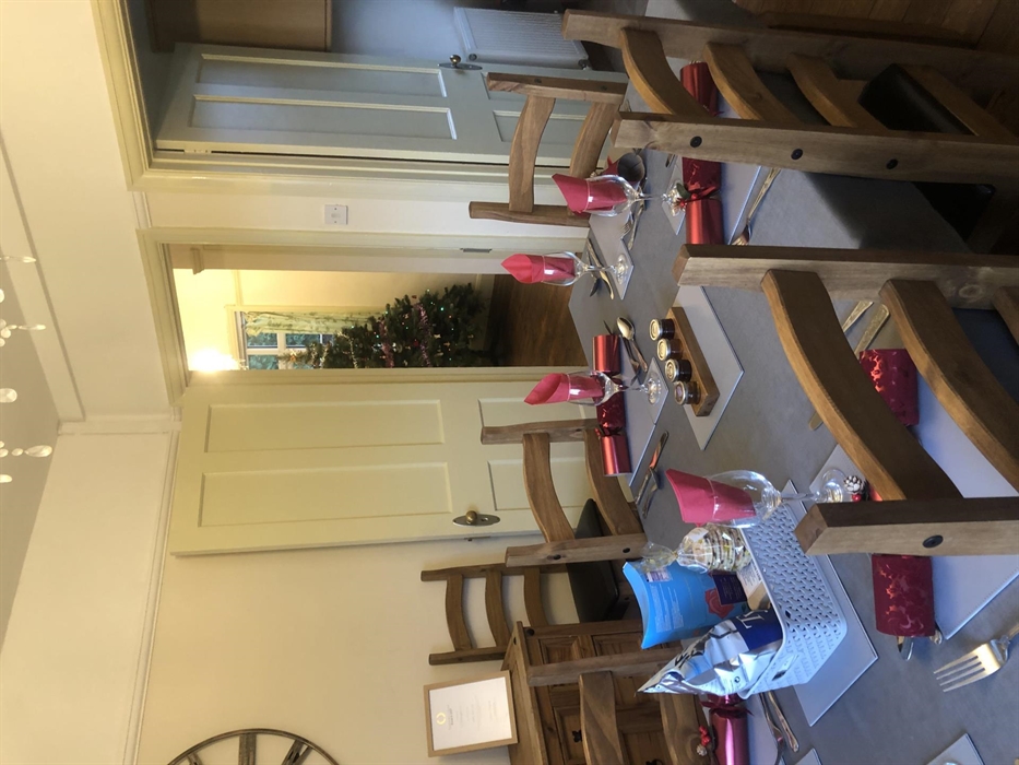 Bevan House is always decorated for Christmas with tree in hall and lights around decking outside.