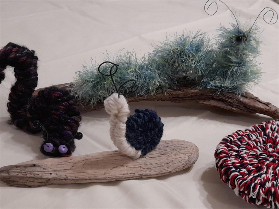 Example creatures and coasters made in our stick weaving workshop