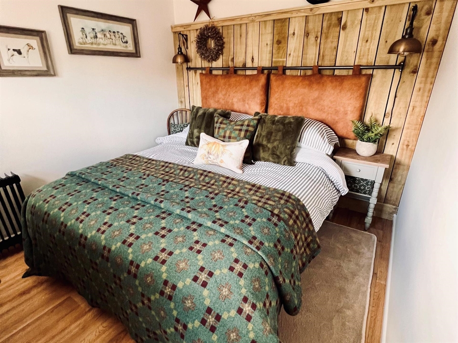 View the surrounding valley from this bedroom, which can be set as a king or twin room. Comfortable and cosy, this small but perfectly formed home dec