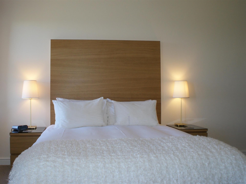 King sized double bed, en-suite bath, 32" TV and Tea and seating area.