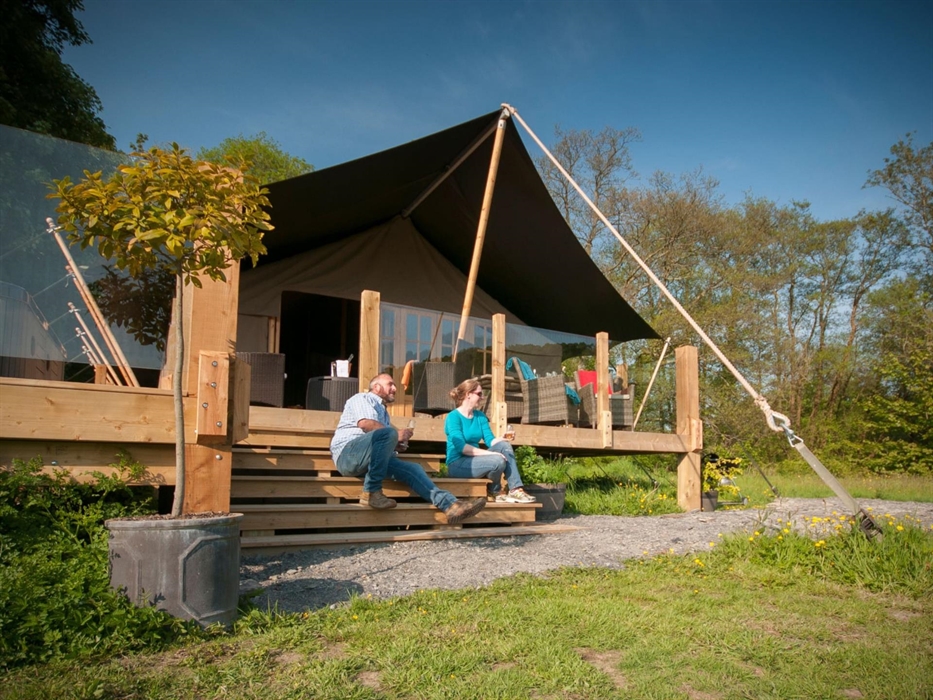 Camnant is our 4 bed (8 person) Safari Tent with large Hot Tub and Sun Deck overlooking meadow