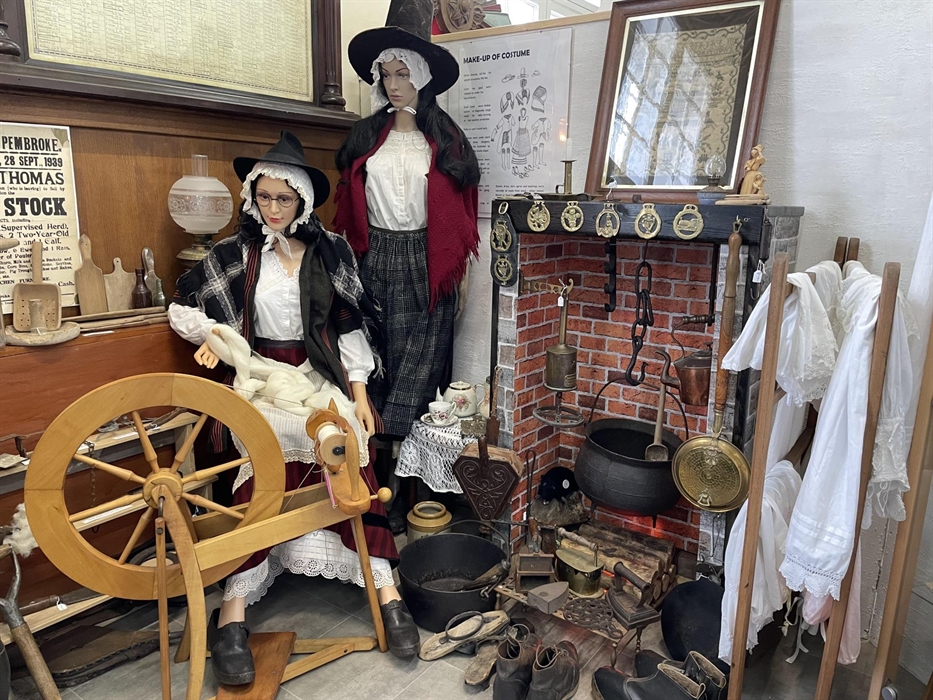 Collection of authentic 19th Century Welsh costume with down-hearth fire and artefacts