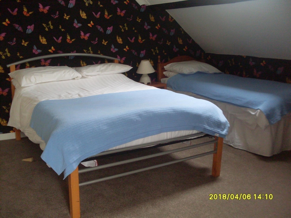 Double and two single beds, ideal for families and groups.