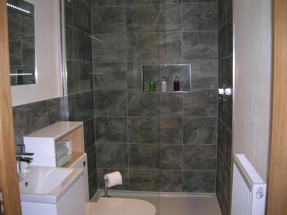 The main bedroom has it's own shower room.  Shampoo, Conditioner and Shower Gel also provided for our guests.