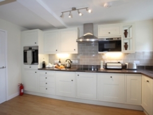 A superb kitchen fitted with all of the modern fittings expected of today's self-catering accommodation