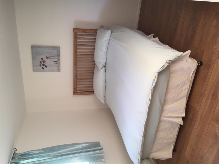 Double bed & double wardrobes with full length mirror, hairdryer & chest of draws