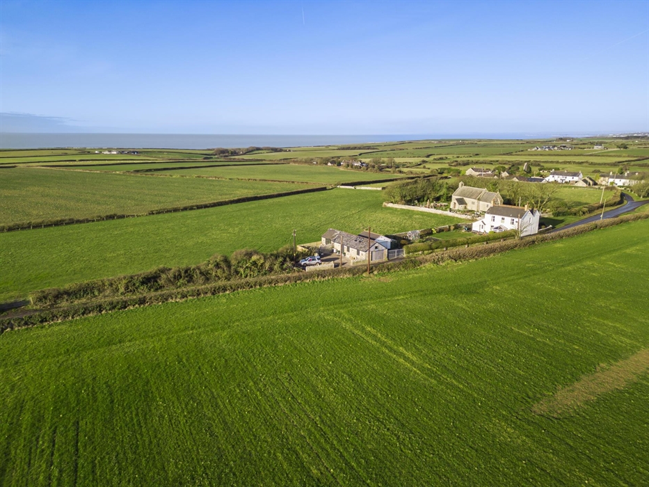 The famous Plough & Harrow historic pub in walking distance