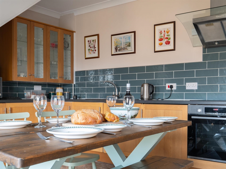 Tableware in kitchen of five star Snowdonia holiday cottage