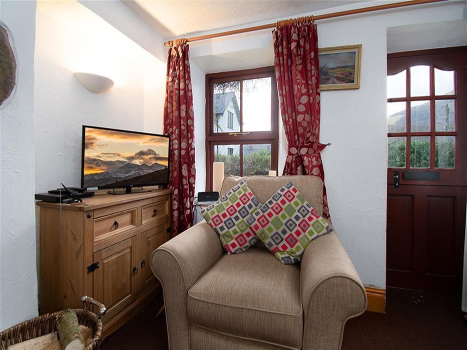 Cosy chair and TV at Y Bwthyn Llanberis