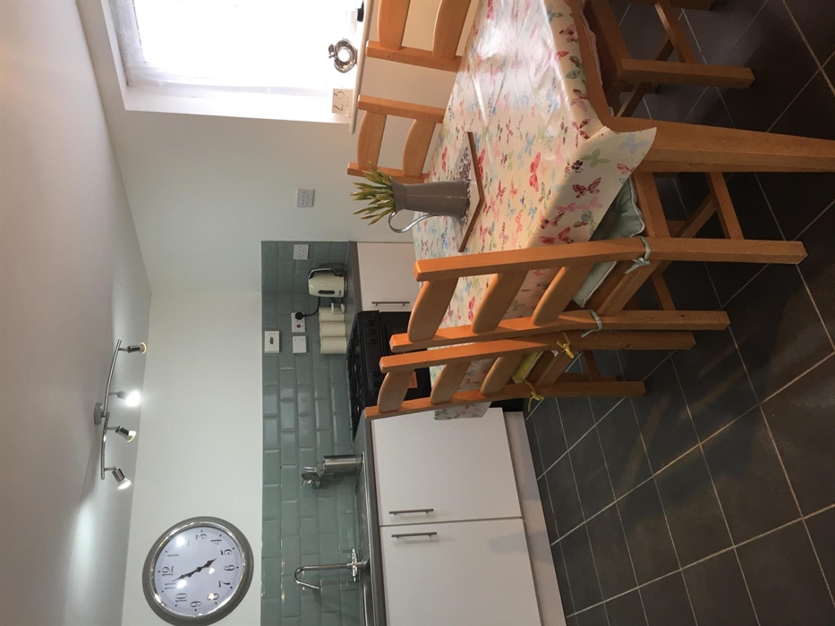 Kitchen is fully equipped with Full fridge freezer, microwave, washing machine, iron & ironing board.