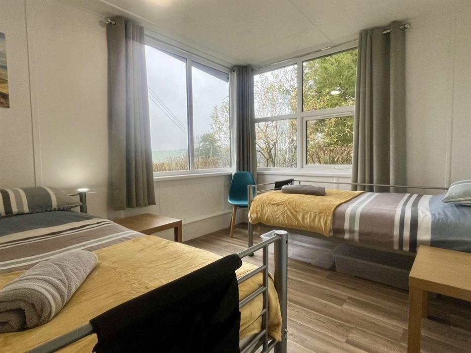 Our bedrooms are simple, comfortable & spacious. On arrival your bed will be made up ready for you, we provide storage under your beds, and a towel. W