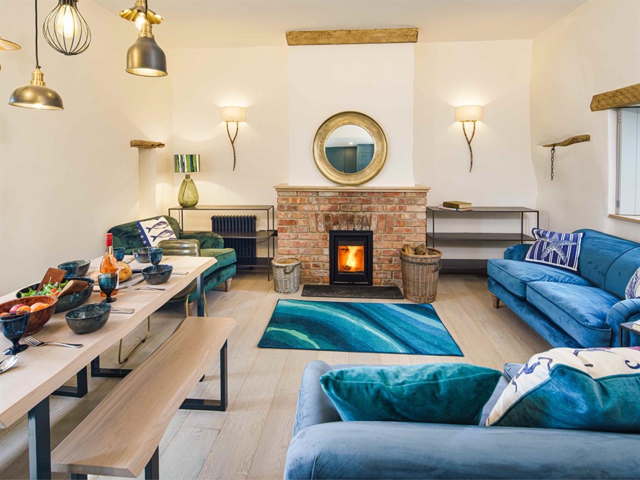 You will find our newly renovated cottage living room very comfortable and spacious. With  wood burning stove, comfortable sofas, modern and useful li