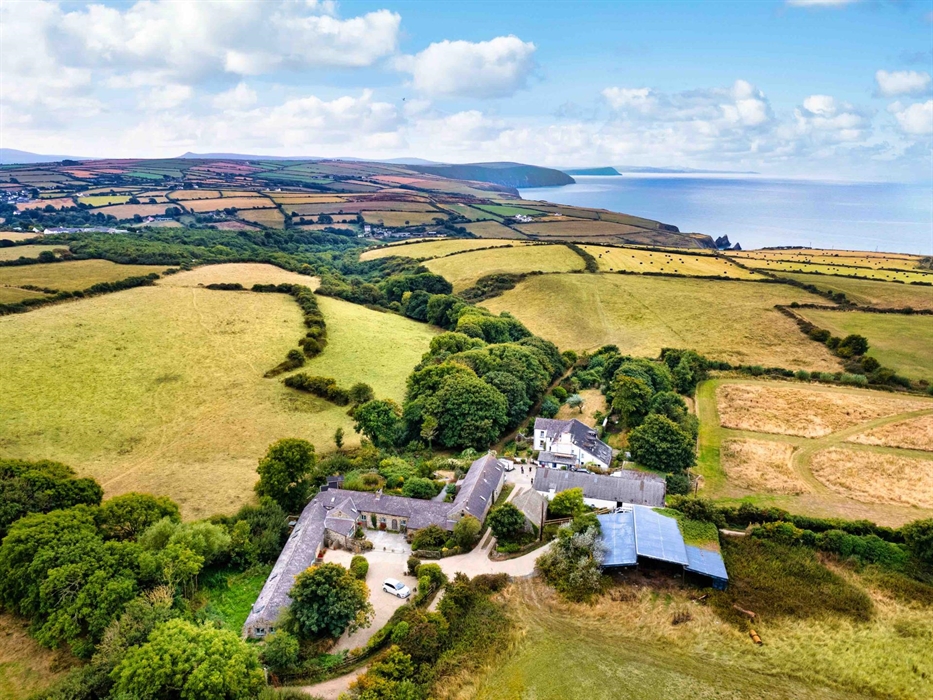 Cwm Connell is a short 15 minute walk through woods or across fields to Ceibwr Cove and the Pembrokeshire Coast Path.  Preseli Hills in the distance a