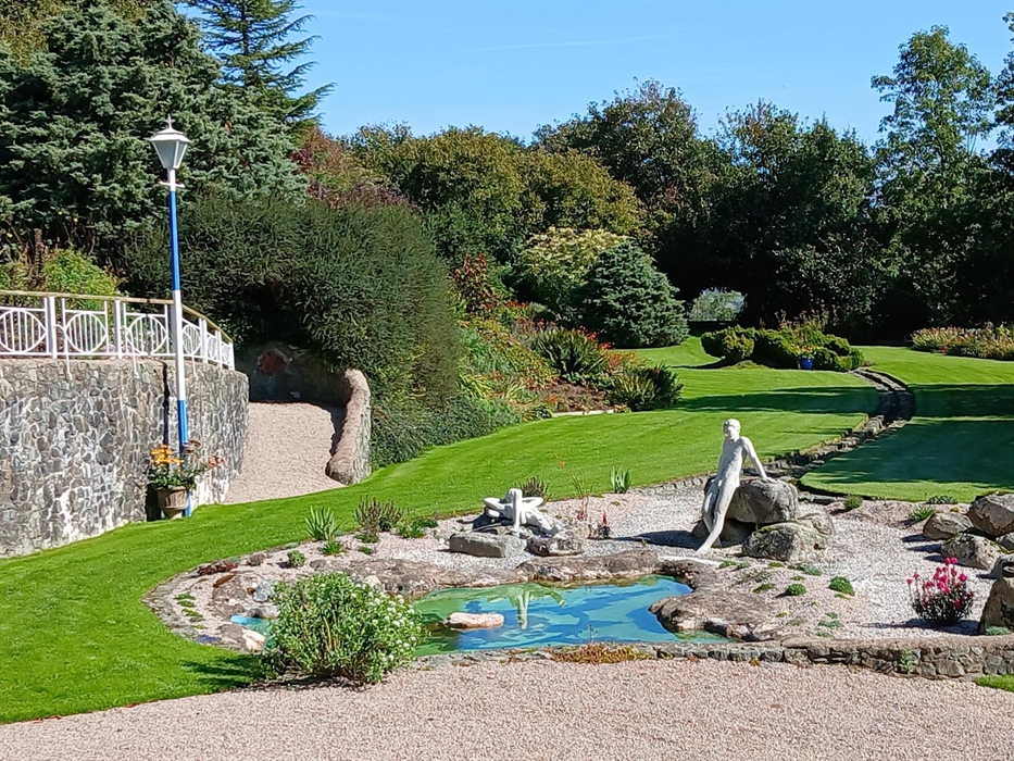 view from house with Grotto wall on lt.