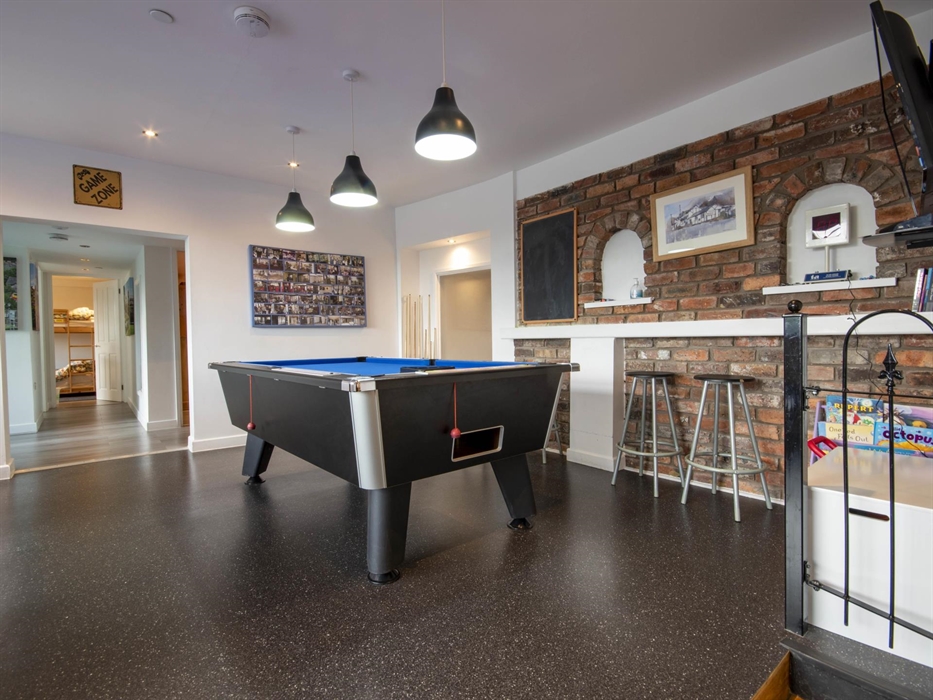 Welsh Row House games room. Pool Table, pool lights and stools.  Room leading through to bedrooms all on one level.