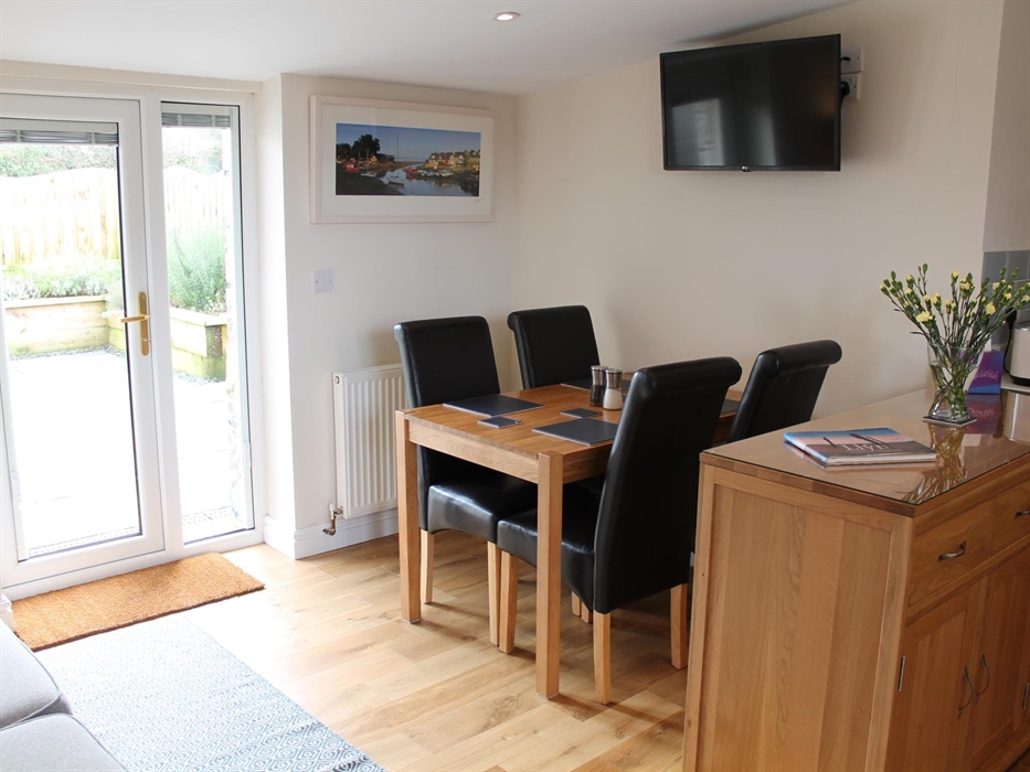 dining area with view of the private patio garden