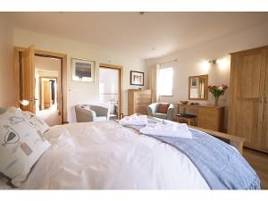 Rear east facing en-suite bedroom in apartment