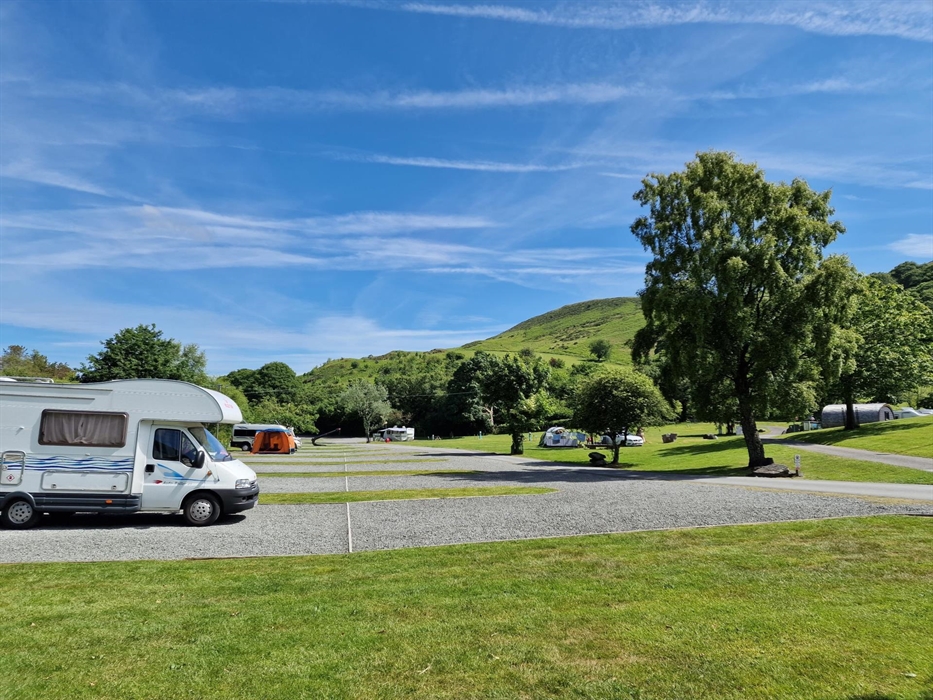 hard standing pitches with EHU with views of mountain