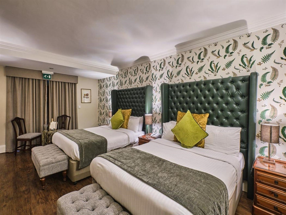 New House Hotel Bedroom