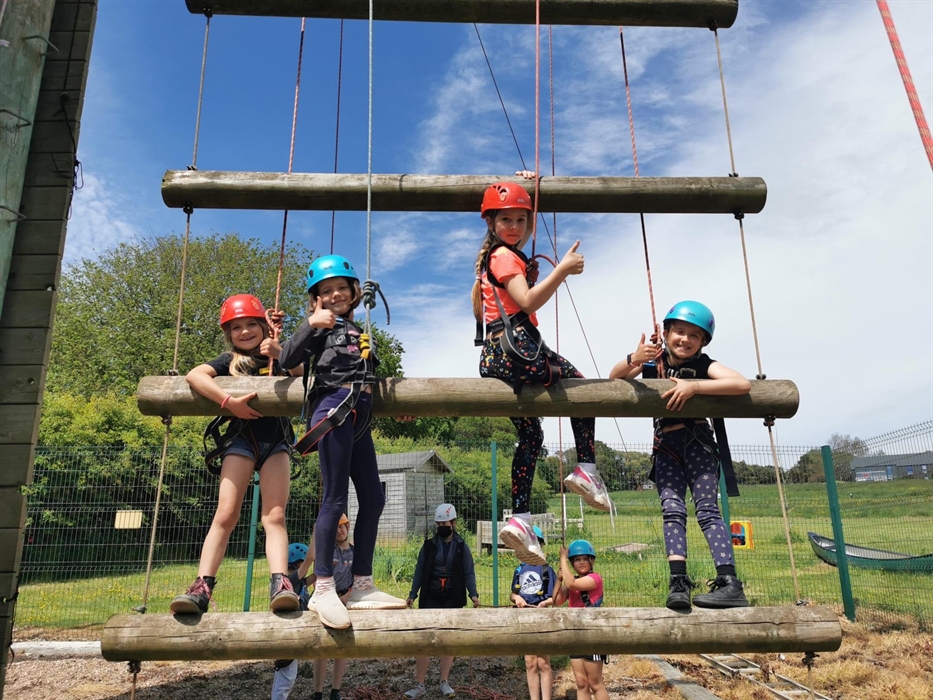 Young children on a climbing frame