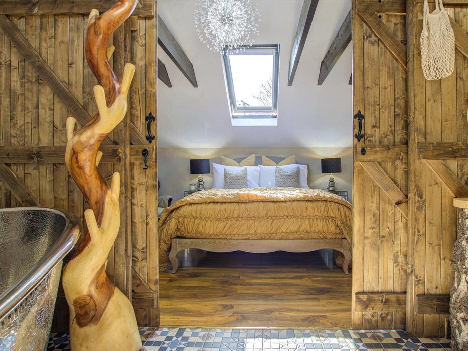 Beautiful character Master Bedroom with oak beams and bright stars above