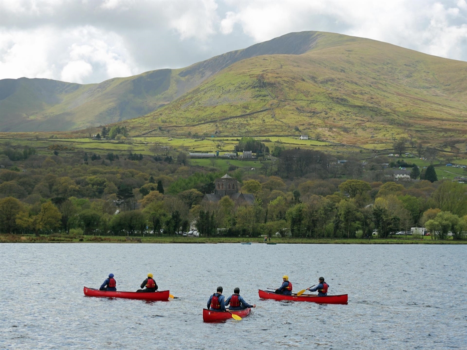 Canoring on Llyn Padarn Lake, Llanberis. Beautiful scenery from the valley of Yr Wyddfa Snowdon