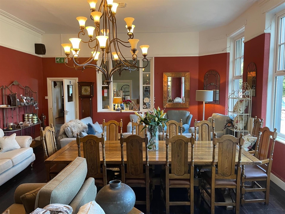 This furniture showroom can be used for resident's private dining for up to 12 people.