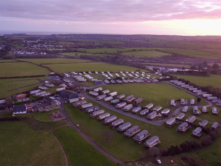 A sunset arial shot of the site.