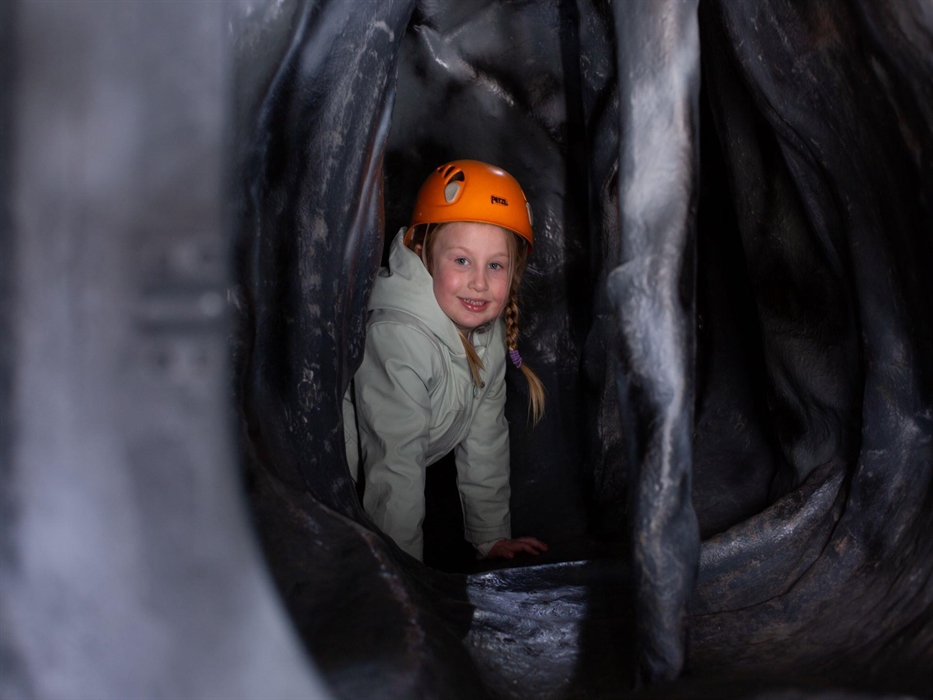 The artificial cave at Parc Bryn Bach is full of twists and turns.