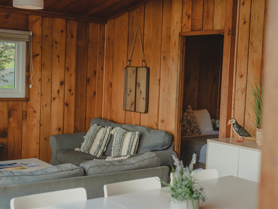 Cosiness meets panoramic views in this bright living space, where the Timber Hill valley lies in a picturesque sprawl