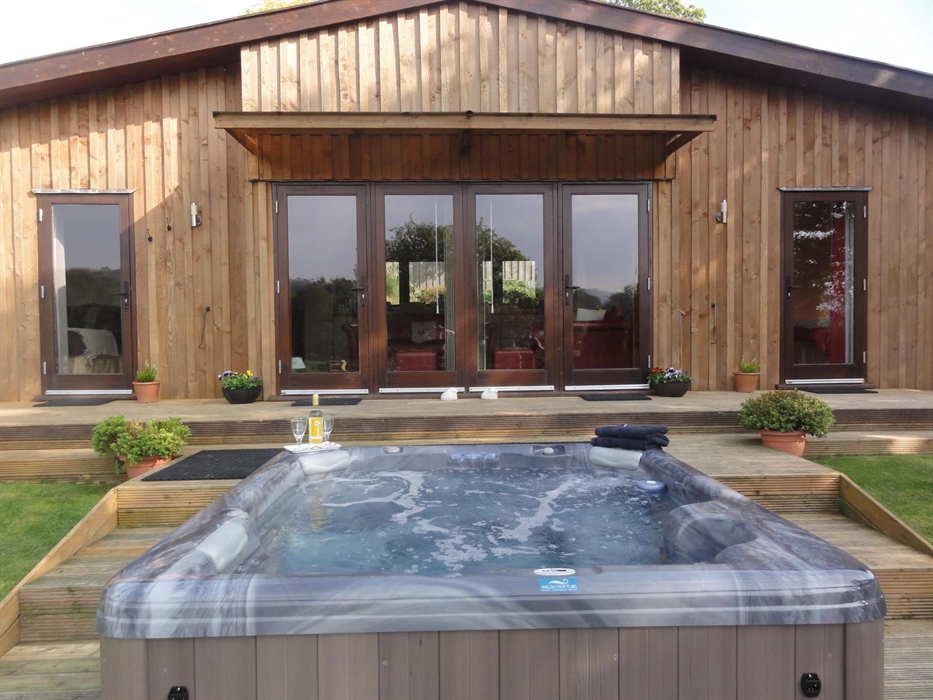 Private spa hot tub located just outside your Lodge.