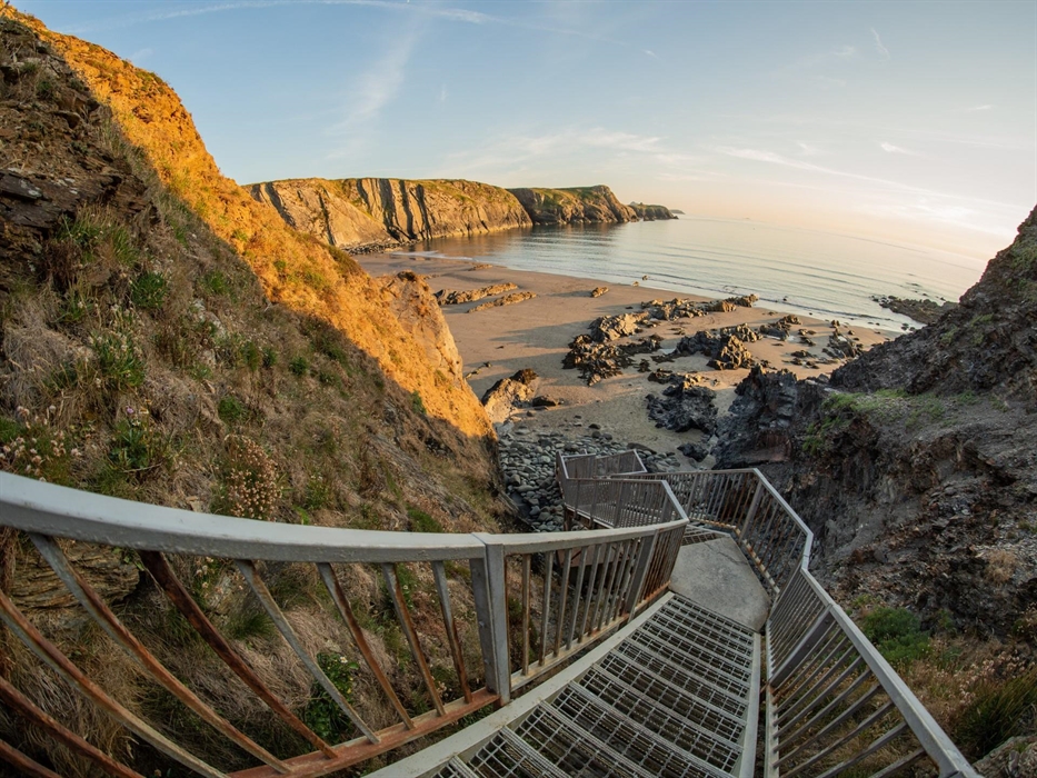 Traeth Llyfn is a pretty sandy and rocky beach between Porthgain and Abereiddi. Accessible only from the Pembrokeshire Coast Path, Traeth Llyfn is bac