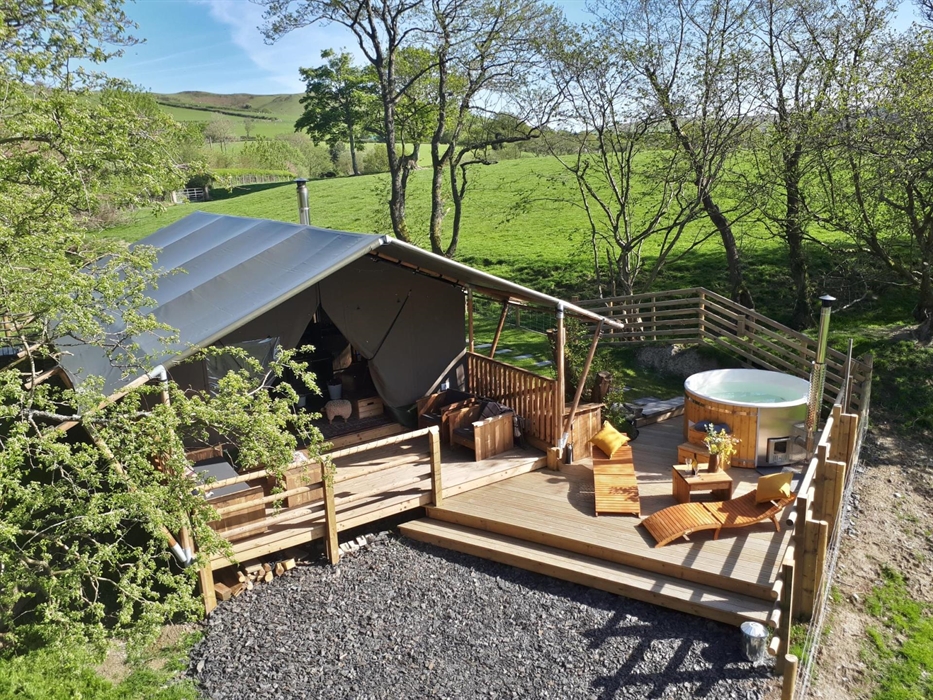 Relax and unwind in your private outdoor sundeck and hot tub