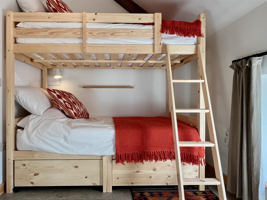 The second bedroom includes bunk beds strong enough to accomodate adults