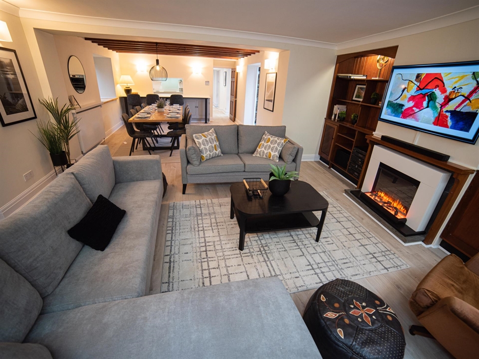 Delight in heartwarming meals within an open-plan dining area, creating a warm ambiance for laughter and meaningful conversations.