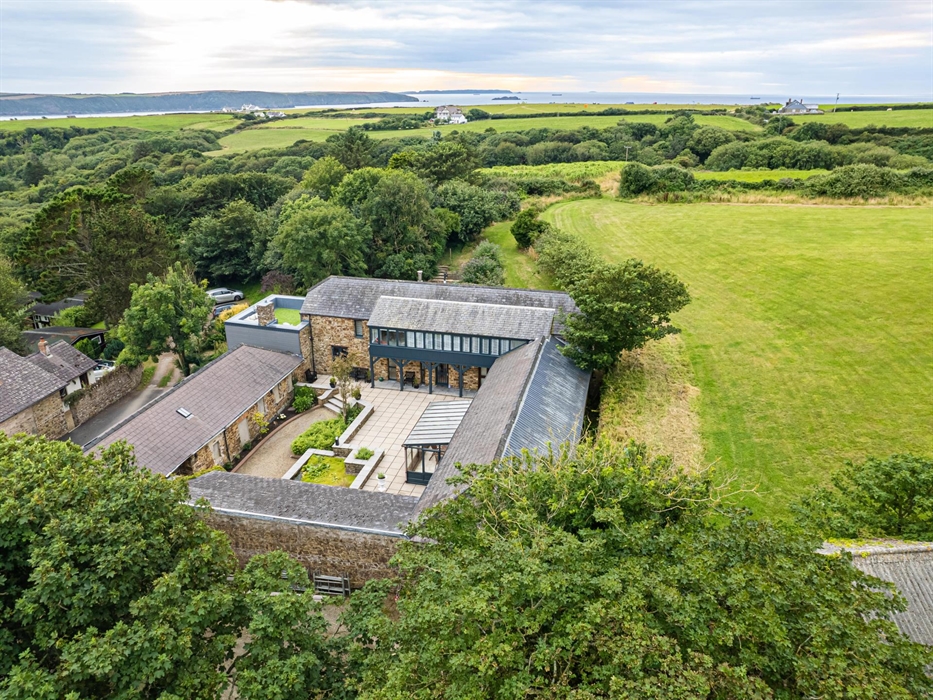 Venture towards the celebrated Pembrokeshire Coast Path, a beckoning adventure just a short walk through local woodland, from your luxurious retreat a