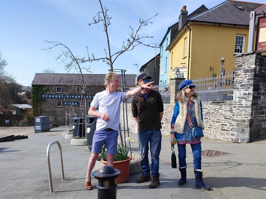 Cardigan Walks sharing Cardigan's history with some tour guests.