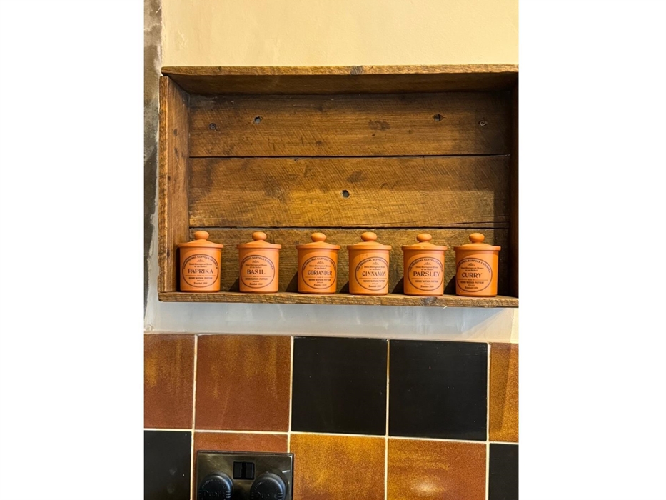 Quirky but well fitted kitchen at Coedfa Bach.  Dishwasher, fridge, freezer, microwave oven and hob.  Set with granite worktop