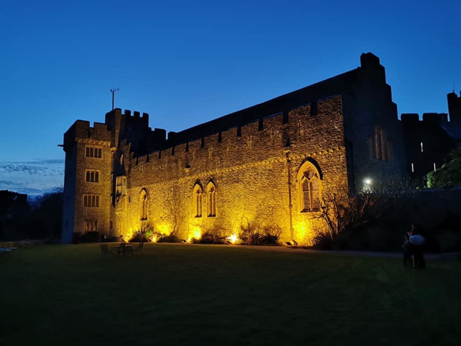 St Donat's Castle lit up in yellow