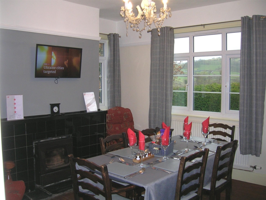 Dining room along with all other rooms have smart TV's and super-fast Wi Fi.